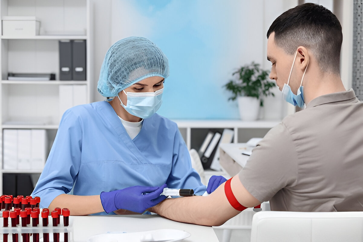 Blood test on a patient's arm in a home setting